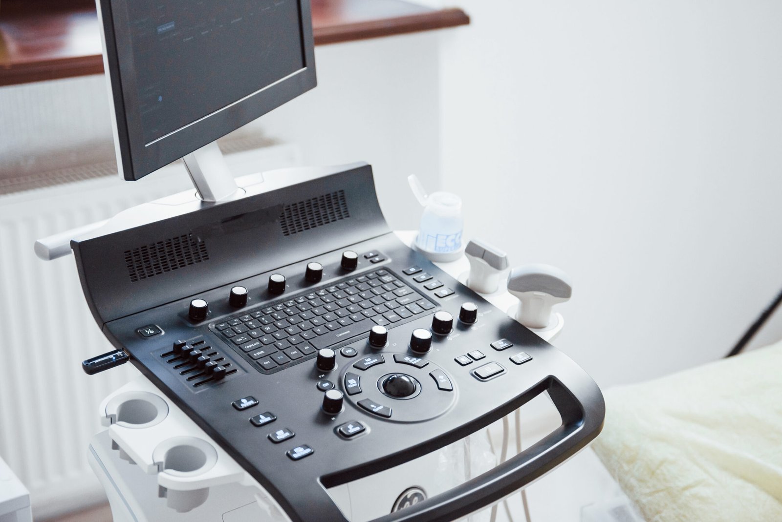 Close up view of control desk of ultrasound device in the clinic